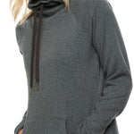 A woman with shoulder-length blonde hair wears a grey hooded fleece pullover with a front pocket and black drawstrings.
