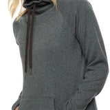A woman with shoulder-length blonde hair wears a grey hooded fleece pullover with a front pocket and black drawstrings.