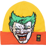 A yellow and orange beanie with an embroidered Batman logo on the front in black.