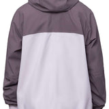 The 686 Dojo Shell Jacket 2024 in this front view has a predominantly gray color scheme with a white panel across the middle and a black hood.