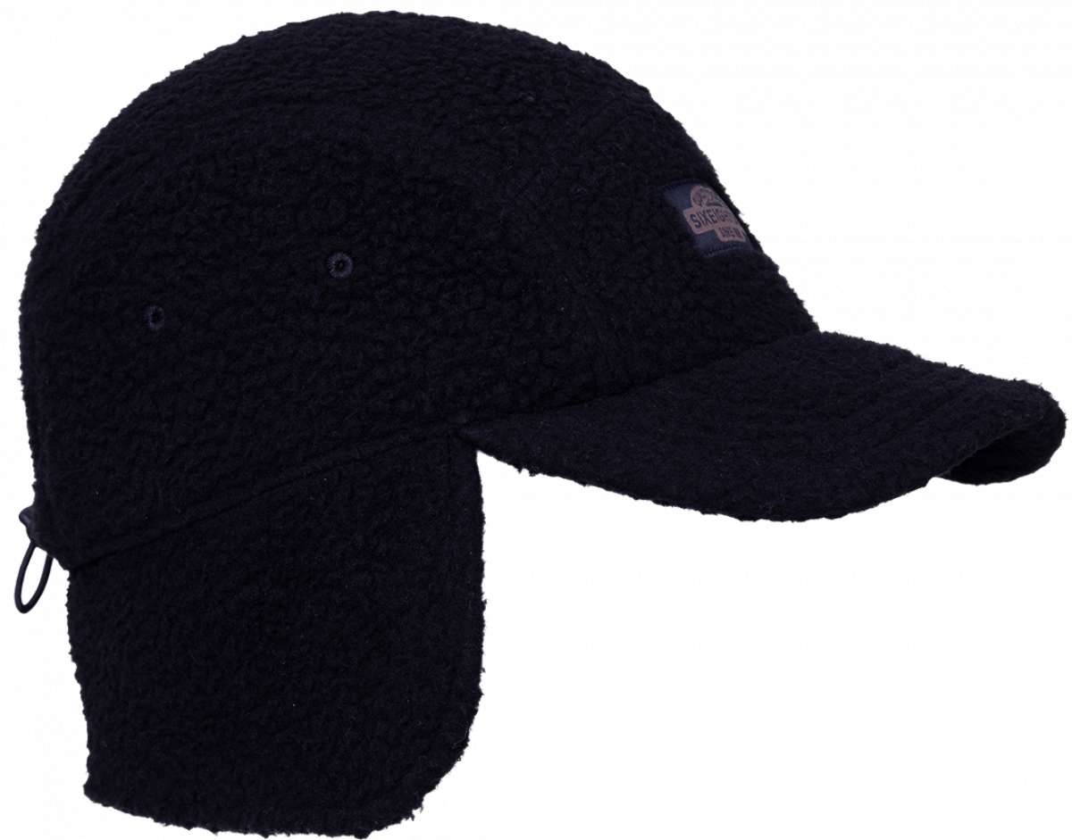 The 686 Fleece Camper Hat 2024 is black with a faux fur exterior and a large faux fur pom-pom on top.