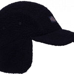 The 686 Fleece Camper Hat 2024 is black with a faux fur exterior and a large faux fur pom-pom on top.