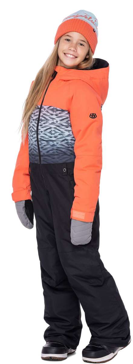 The 686 Girls Shine Insulated One Piece Snowsuit is predominantly coral orange with a grey and white patterned section on the front.