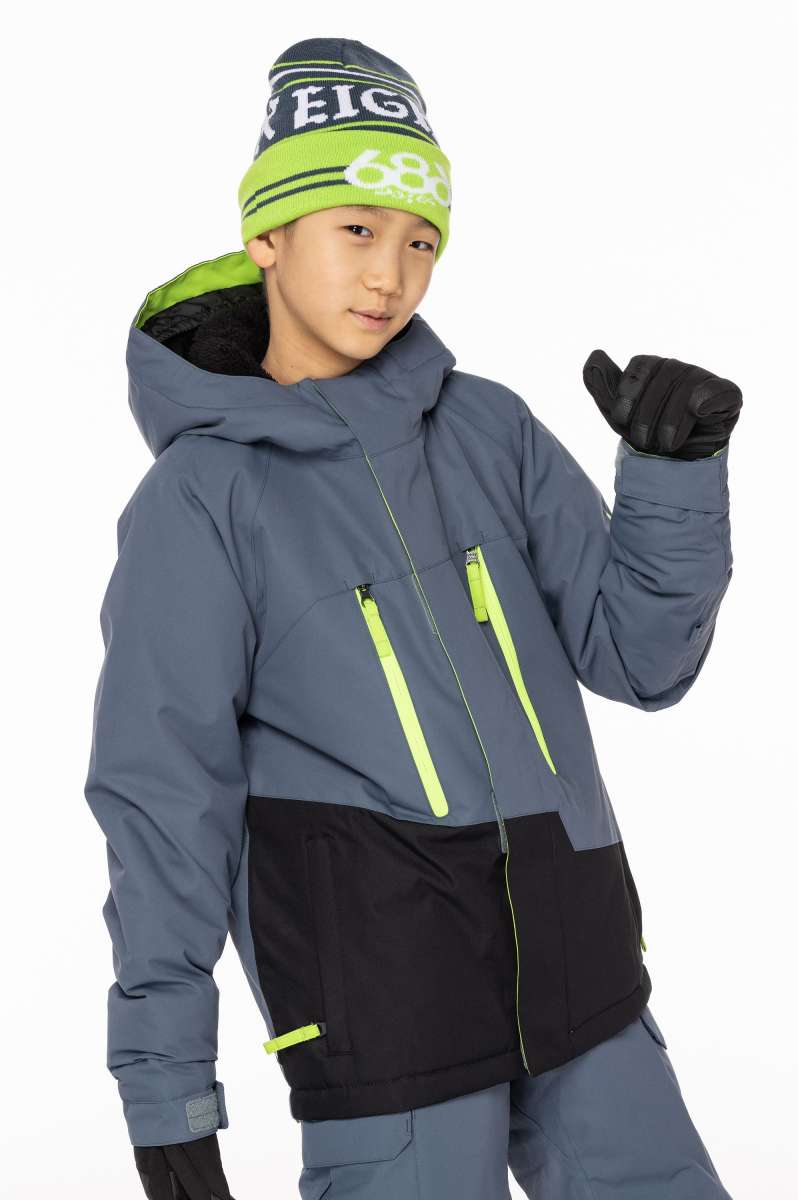 The 686 Junior Geo Insulated Jacket 2023 is primarily gray with lime green accents and features an insulated hood.