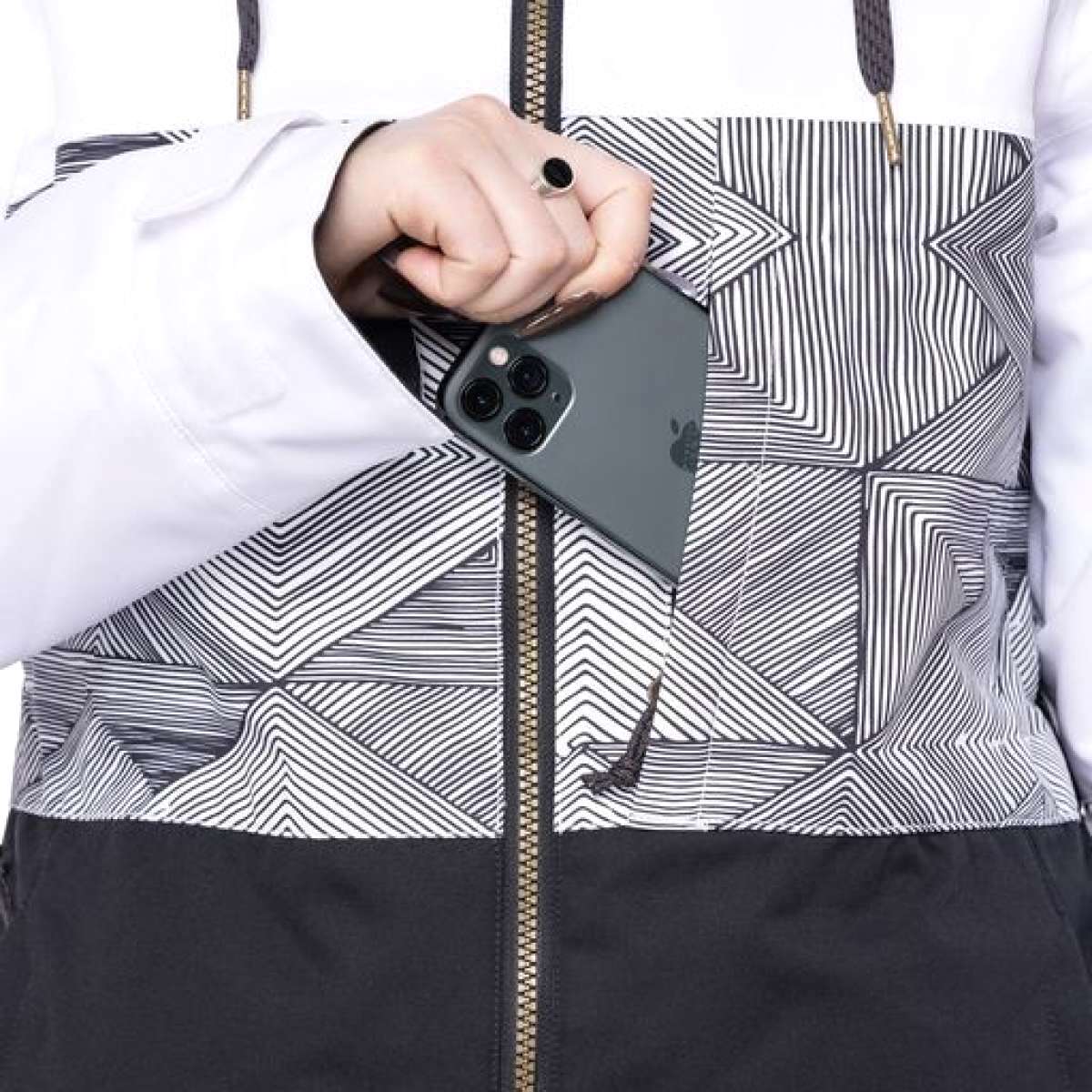The 686 Women's Athena Insulated Jacket 2022 is predominantly white with black accents and features an abstract line pattern on the front.