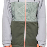 The 686 Women's Athena Insulated Jacket 2022 is predominantly gray with a light green patterned section on the upper chest area and a distinctive coral stripe down the center zipper.
