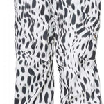 The 686 Women's Aura Insulated Cargo Pant 2024 has a white base color with black spots and features multiple zippered pockets on both sides.