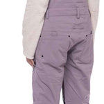 The 686 Black Magic bibs have a black quilted pattern and are fully insulated with a thick white lining.