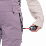 The 686 Ladies Black Magic Insulated Bib 2023 is depicted from the front view, showcasing its black color and distinctive insulated design.