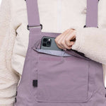 The 686 brand's black bib pants with an insulated design are showcased in this front view.