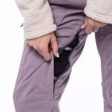 The 686 Ladies Black Magic Insulated Bib Pant is primarily black with a textured pattern on the front view.