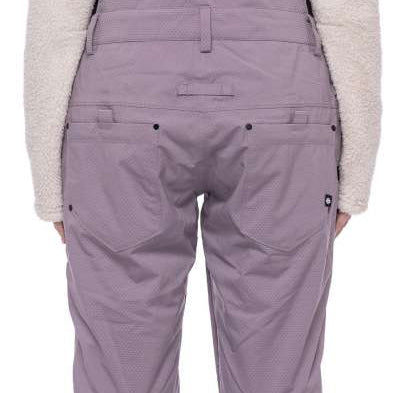 The 686 Ladies Black Magic Insulated Bib has black straps and a quilted pattern on the front.