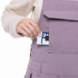 The black 686 bib features an insulated design with a white and gray pattern.