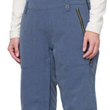 The 686 Women's Black Magic Insulated Bib 2024 is shown from the front view in black with zippered pockets and an adjustable waist strap.