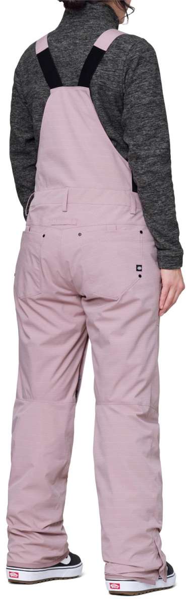 The 686 Black Magic Insulated Bib features a black color with an insulated design.