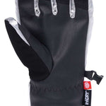 The 686 Ladies Fortune Glove 2023 in black has a silver trim and a red snap button closure.