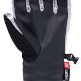 The 686 Ladies Fortune Glove 2023 in black has a silver trim and a red snap button closure.