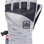 The 686 Fortune glove has a black leather palm and back on a gray quilted fabric with an embossed logo patch above the wrist.