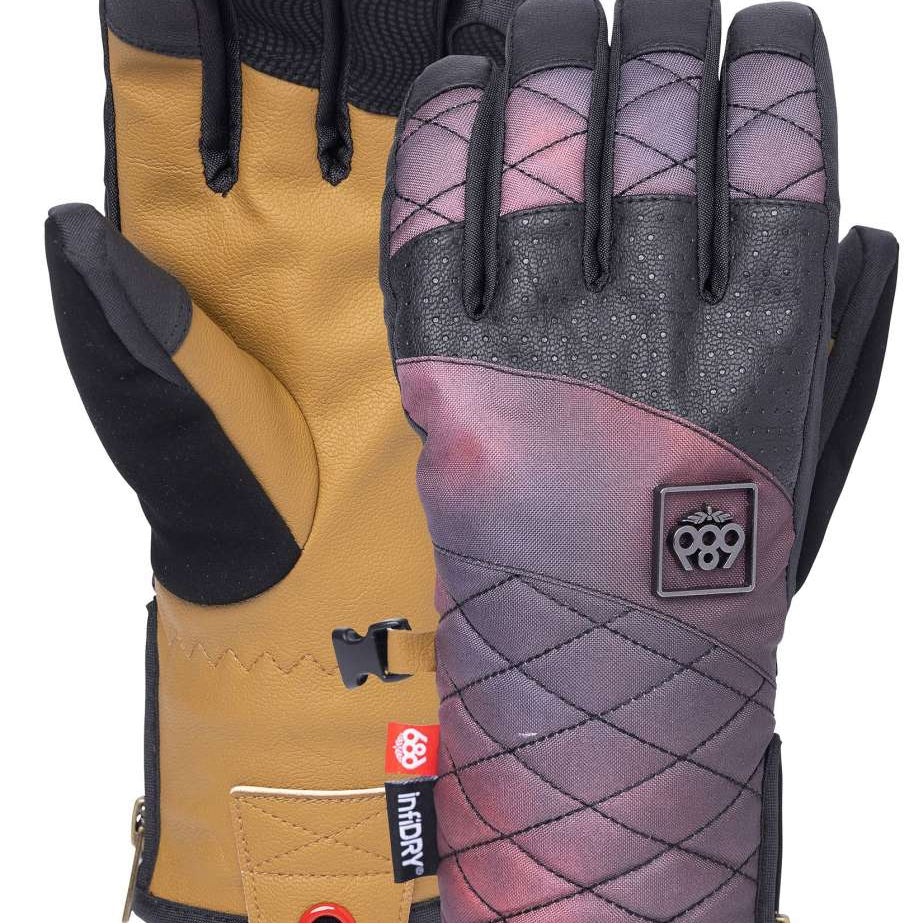 The 686 Ladies Fortune Glove 2023 is primarily tan with black accents and a distinctive quilted pattern on the wrist.