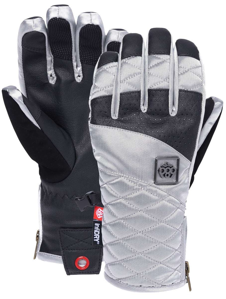 The 686 Ladies Fortune Glove 2023 is predominantly black with silver accents and a quilted pattern on the back.