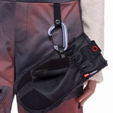 The 686 Women's Geode Thermagraph Bib features a pink and grey color scheme with a quilted pattern on the upper leg area.