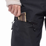 The 686 Women's Geode Thermagraph Bib from the waist down with black straps on the sides and a zippered pocket at the back.