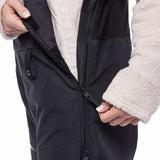 The 686 Women's Geode Thermagraph Bib 2023 is shown in black with an insulated hood and front zipper.