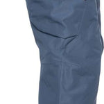 The 686 Ladies Geode Thermagraph Pant from 2023 is slate blue with a zippered pocket on the upper thigh and an elastic waistband.