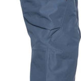 The 686 Ladies Geode Thermagraph Pant from 2023 is slate blue with a zippered pocket on the upper thigh and an elastic waistband.