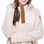 The 686 Ladies Hemlock Fleece Hoodie 2023 is cream-colored with an insulated hood and brown accents.