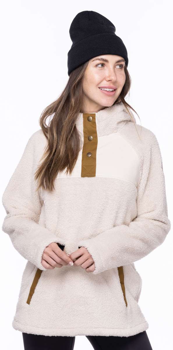 The 686 Ladies Hemlock Fleece Hoodie 2023 is primarily white with brown accents and a large hood.