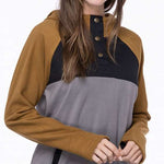The 686 Ladies Hemlock Fleece Hoodie in black and brown has an insulated hood with a drawstring.