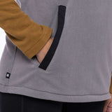 The 686 Ladies Hemlock Fleece Hoodie in light grey has an insulated hood and two side pockets with black trim.
