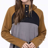 The 686 Ladies Hemlock Fleece Hoodie in grey and tan has an insulated hood.
