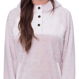 The 686 Women's Hemlock Fleece Hoodie 2024 features a light pink color with an insulated hood and three black buttons down the front.