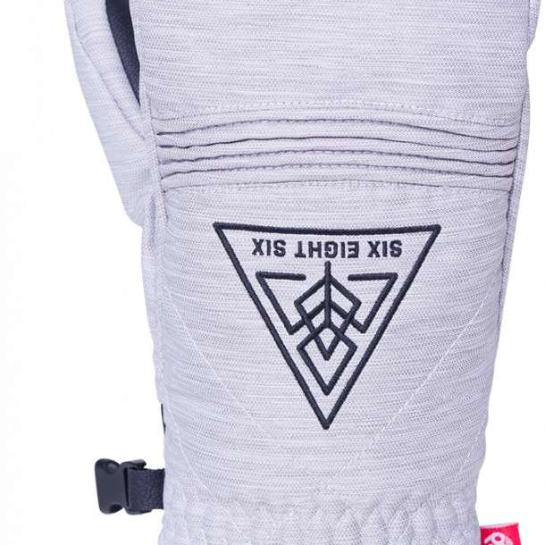 The 686 Women's Jubilee Mitten 2024 in front view has a white exterior with black accents and a gray faux fur lining.