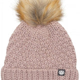 The 686 Ladies Majesty Cable Knit Beanie from the front view features a dusty rose color with a faux fur pom-pom on top.