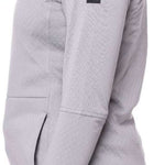 The 686 Ladies Mission Grid Fleece Hoodie 2023 is light gray with an insulated hood and a logo patch on the left sleeve.