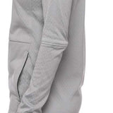 The 686 Ladies Mission Grid Fleece Hoodie, viewed from the back, is light gray with an insulated hood and a small black logo on the left sleeve.