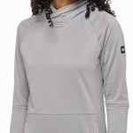 The 686 Ladies Mission Grid Fleece Hoodie 2023 is light gray with a subtle diamond pattern and a black zipper down the front.