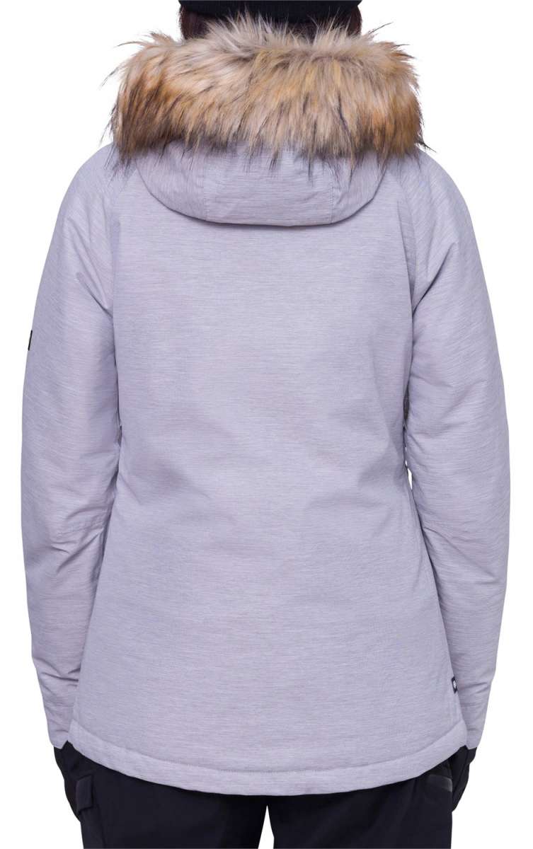 The 686 Women's Nova Insulated Jacket 2024 is shown from behind in light gray with a fur-lined hood.