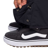 The 686 Women's Smarty 3-in-1 Cargo Pant in black has multiple pockets on both legs and a zippered back pocket.