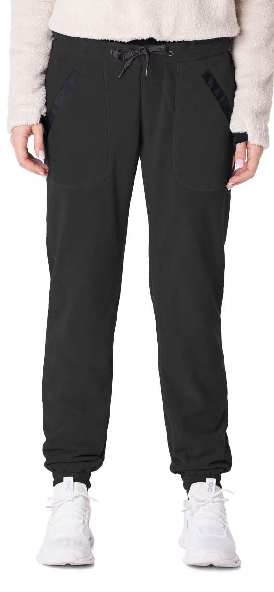 The 686 Ladies Smarty 3 In 1 Cargo Pants 2023 are black with two zippered side pockets and a cargo pocket on the side.