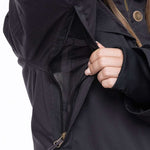 The 686 Women's Spirit Insulated Jacket 2024 has an insulated hood and is black with zippered pockets on the front.