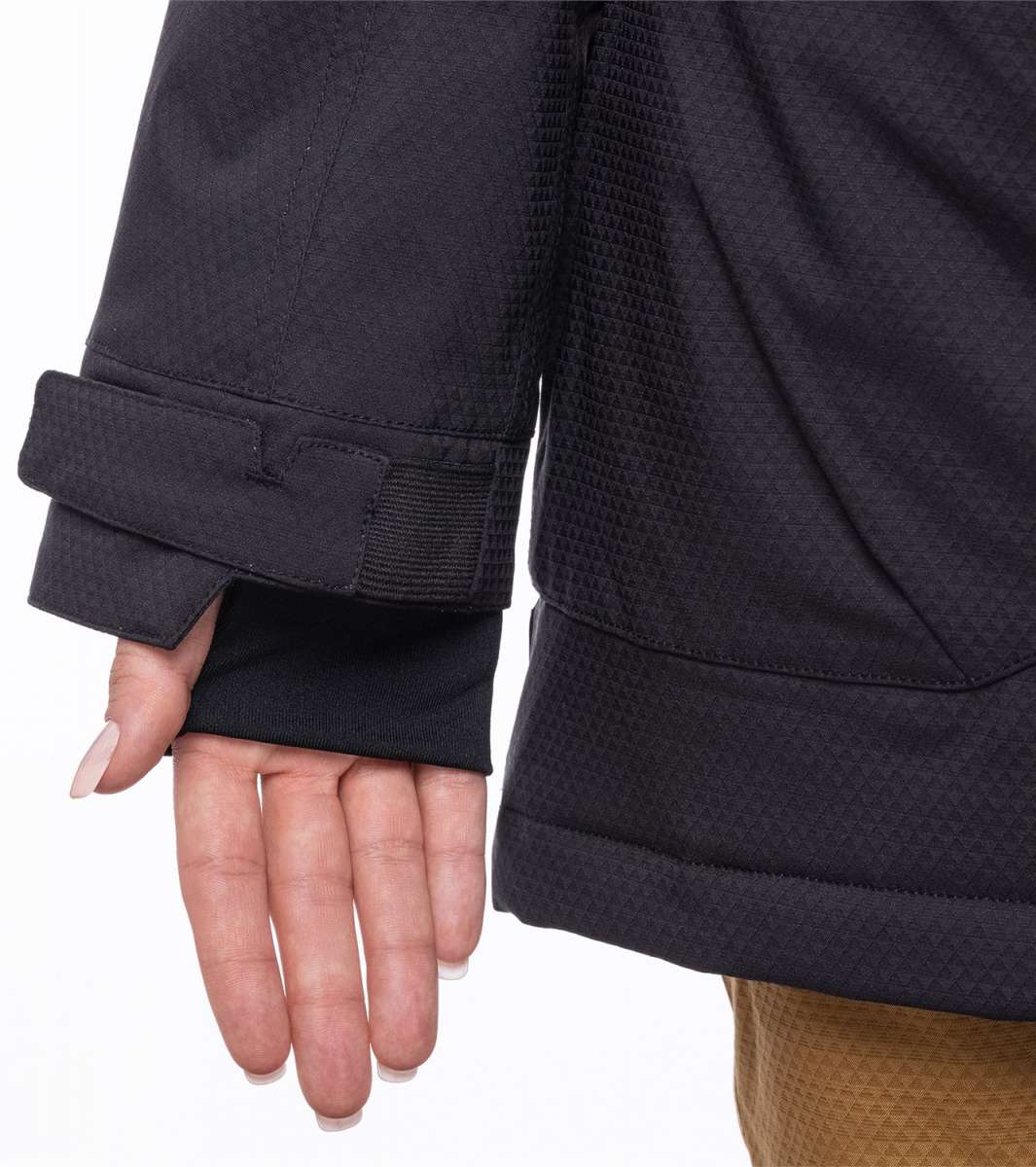 The 686 Spirit Insulated Jacket 2024 for women has a charcoal color with a quilted pattern and an adjustable cuff.