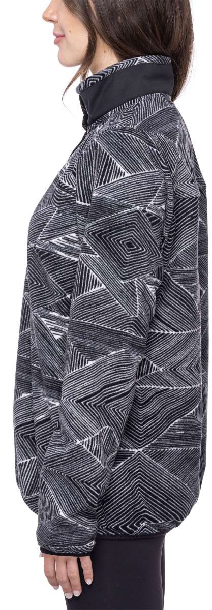 The 686 Tioga Fleece Pullover is predominantly black with a white abstract geometric pattern and a high collar.