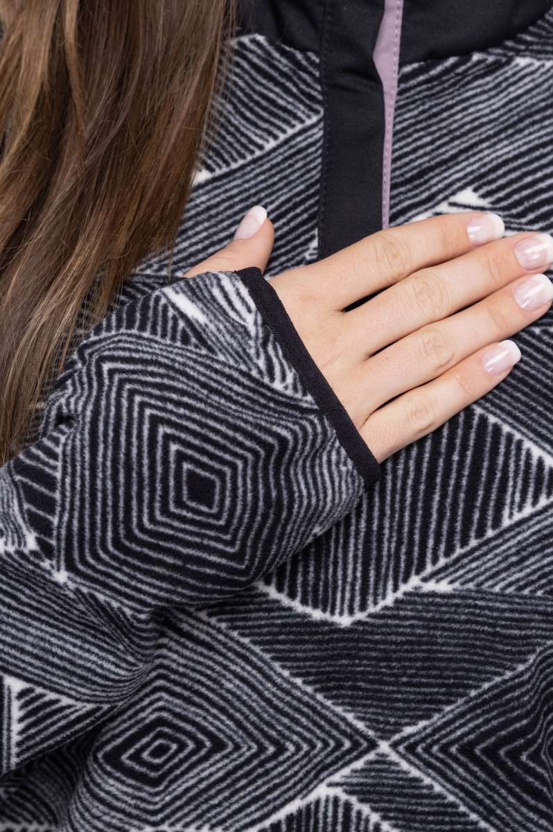 The 686 Ladies Tioga Fleece Pullover 2023 is black and white with a geometric pattern.