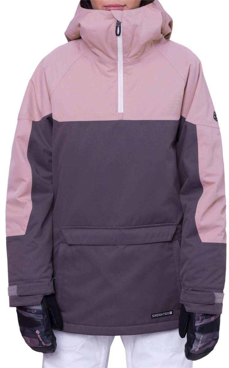The 686 Women's Upton Insulated Anorak Jacket 2024 in the front view showcases a pink and dark gray color scheme with an insulated hood.
