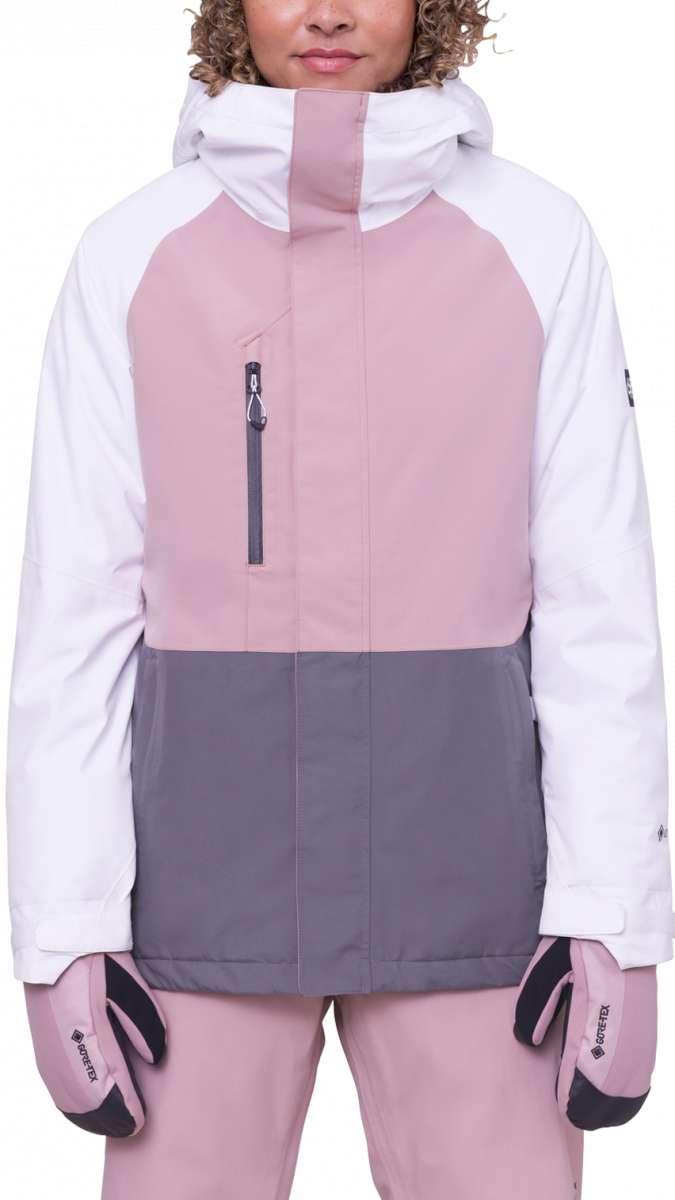 The 686 Women's Willow GORE-TEX Insulated Jacket 2024 in this front view features a predominantly pink color scheme with white accents on the sleeves and gray at the bottom.