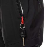 The 686 Quantum Thermagraph Pant 2024 has a solid black color with zippered pockets on both sides and a zipper fly.
